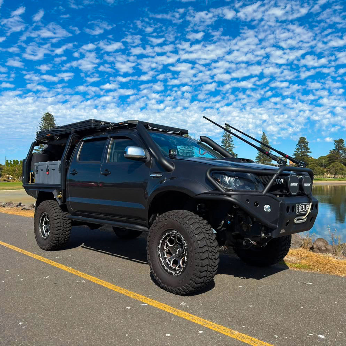 2009 Toyota Hilux with H1-HEX LFT Wheels side angle 4x4 17x9 0mm offset Grey Dual Cab