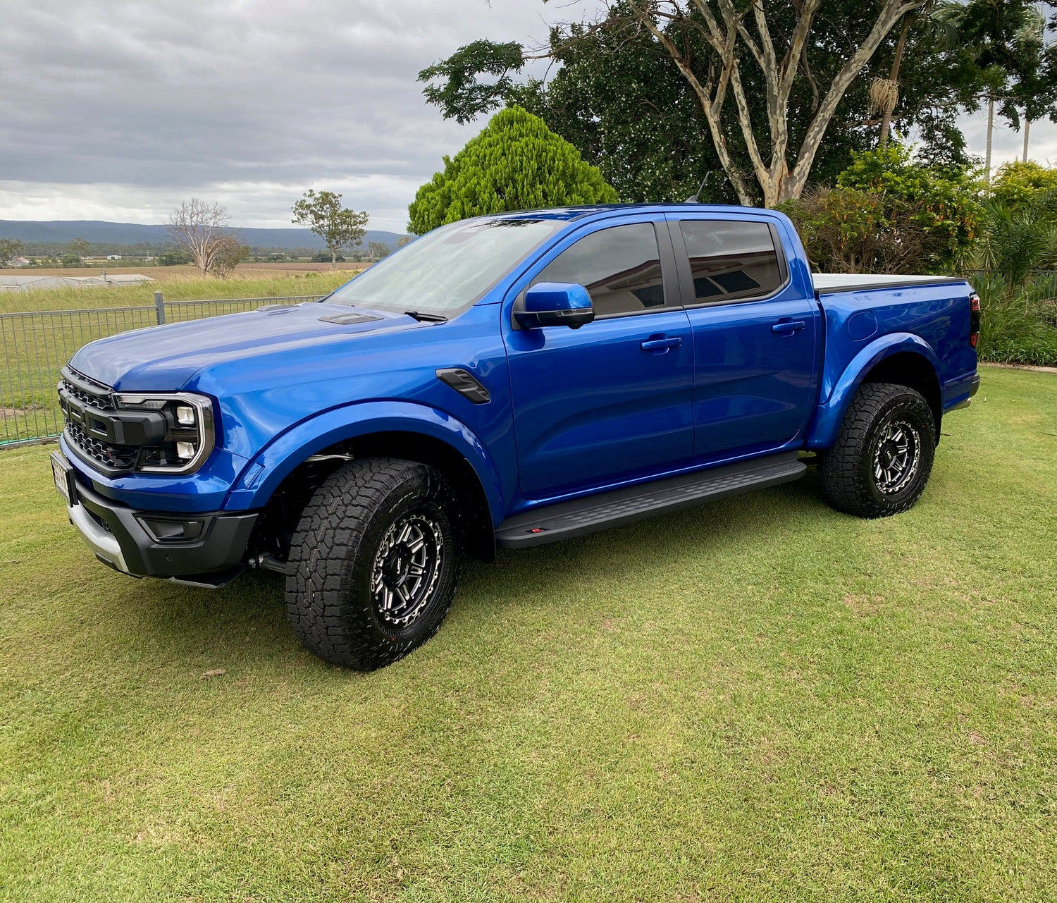 2025 Ford Ranger Raptor with M1-MOTION LFT Wheels side angle 4x4 17x9 +22mm offset Blue